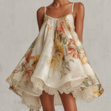 Brianda | Vestido mini de organza con volantes de flores beis y borde de encaje