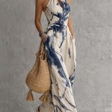 Mono con escote halter y estampado en tinta