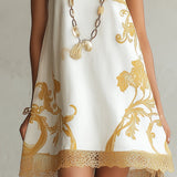 Hersilia | Vestido mini de encaje blanco con motivos dorados