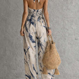 Mono con escote halter y estampado en tinta
