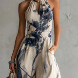 Mono con escote halter y estampado en tinta