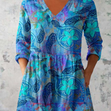 Isabel | Blusa larga azul con escote en V