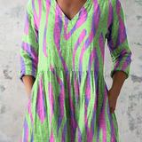 Natalia | Blusa larga verde profundo con escote en V