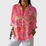 Erundina | Blusa de palmeras sobre fucsia
