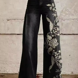 Escolania | Pantalón ancho estampado de flores sobre vaquero negro