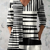 María | Blusa larga con escote en V en blanco y negro