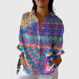Emérita | Blusa de flores sobre azul y morado