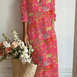 Telma | Vestido de palmeras sobre fucsia