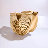 Estela – Bolso metálico escultural