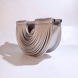 Estela – Bolso metálico escultural