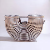Estela – Bolso metálico escultural