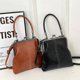 Cleofé | Bolso de mano con cierre de boquilla