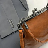 Cleofé | Bolso de mano con cierre de boquilla