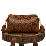 Ludgarda | Bolso cilíndrico con relieve barroco