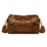 Ludgarda | Bolso cilíndrico con relieve barroco