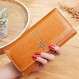 Sabela | Cartera con broche metálico