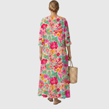 Zita | Vestido de flores fucsia sobre verde