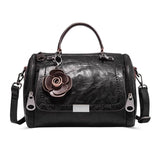 Gardenia | Bolso cilíndrico con flor a mano