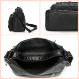 Minerva | Bolso bandolera con broche de corazón