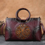 Magnolia | Bolso de mano con medallón floral