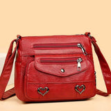 Rosana | Bolso bandolera con adornos de corazón