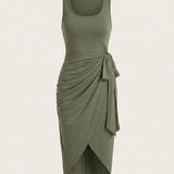 Kira – Vestido midi drapeado con nudo lateral