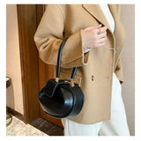 Carmen – Bolso de mano minimalista