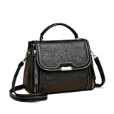 Acacia | Bolso de mano con relieve floral