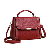 Acacia | Bolso de mano con relieve floral