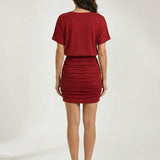 Valeria – Vestido mini ajustado fruncido efecto moldeador