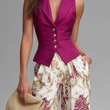 Conjunto de chaleco rosa y pantalones anchos con estampado floral