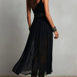 Conjunto de top negro y falda maxi de tul