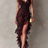 Vestido chic negro y rojo con flores y volantes