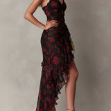 Vestido chic negro y rojo con flores y volantes