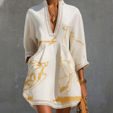 Leonila | Vestido mini de encaje de ganchillo marfil con motivos dorados y escote en V