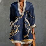 Cecilia | Vestido mini de encaje de ganchillo azul marino con motivos dorados y escote en V