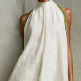 Ágata | Vestido mini línea A sin mangas blanco y verde oliva con flores