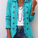 Silvana | Chaqueta de punto acanalado turquesa con volantes