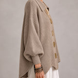Florencia | Cárdigan oversize de canalé con bajo ondulado, beige arena