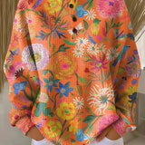 Prudencia | Jersey naranja de flores blancas