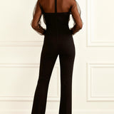Sira | Mono elegante con detalle de rejilla, negro