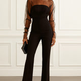 Sira | Mono elegante con detalle de rejilla, negro