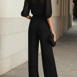 Elisabet | Conjunto con blusa transparente y pantalón de pierna ancha, negro