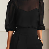 Elisabet | Conjunto con blusa transparente y pantalón de pierna ancha, negro