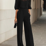 Elisabet | Conjunto con blusa transparente y pantalón de pierna ancha, negro