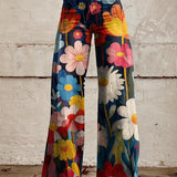 Lenia | Pantalón ancho estampado de flores grandes sobre azul