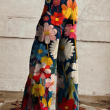 Lenia | Pantalón ancho estampado de flores grandes sobre azul