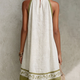 Ágata | Vestido mini línea A sin mangas blanco y verde oliva con flores